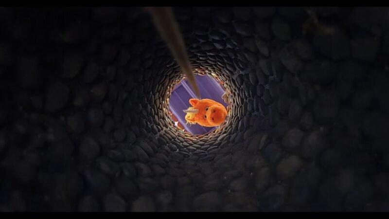 An orange unicorn peers over the opening of a dark stone-lined well in official Buddy key art.