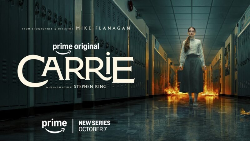 Carrie stands in a school hallway with flames at either side in the official Prime Video key art.